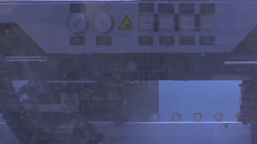 Technology, Production, Manufacture and Industry Concept - Close Up of Machine At