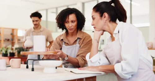 Women, potter and explain for pottery course for sculpture design, learning technique