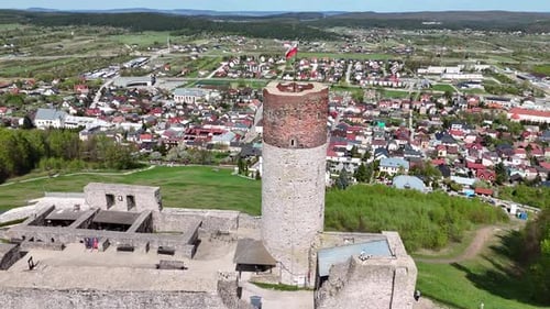 Drone shot of Checiny Royal Castle tower in Poland