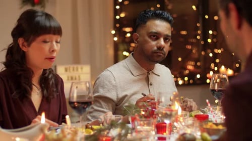 Friends Gather and Eat Dinner at Home