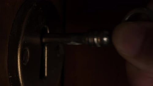 Inserting Key Into Lock