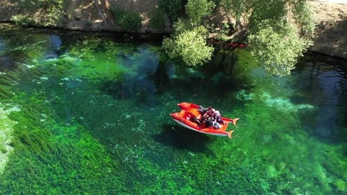 Aerial View Of People Boating On The Lake