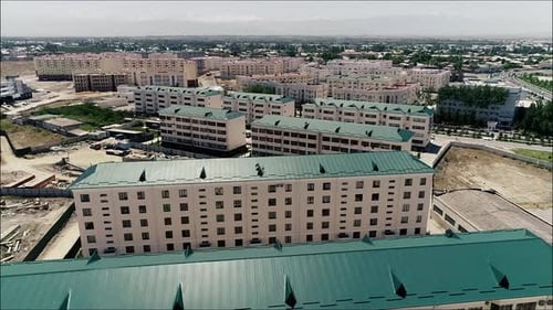 Aerial View of Buildings in a Sunny City