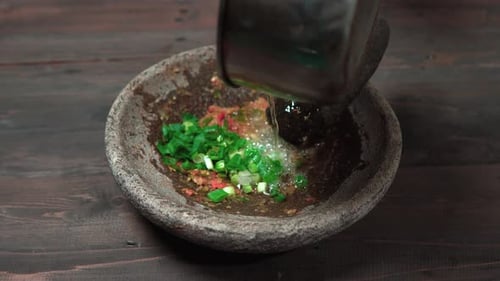hot oil is spilled on the chili sauce