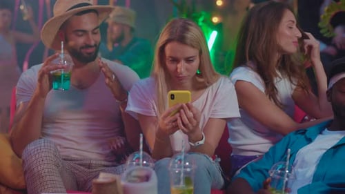 Friends Enjoy Nightlife at an Urban Nightclub