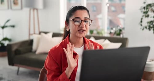 Woman Waving During Video Call From Home
