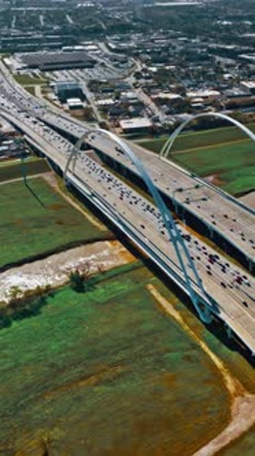 Aerial view of traffic on a highway bridge in Dallas, USA