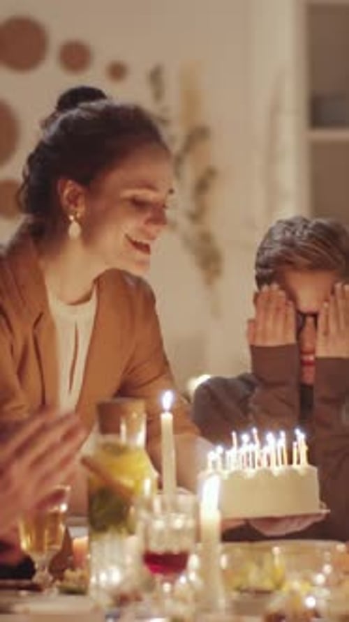 Friends Celebrate Birthday with Cake and Candles