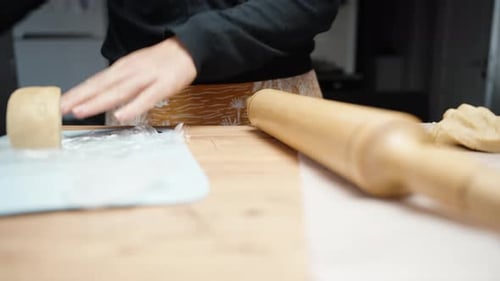 Person Prepares Dough in Home Kitchen