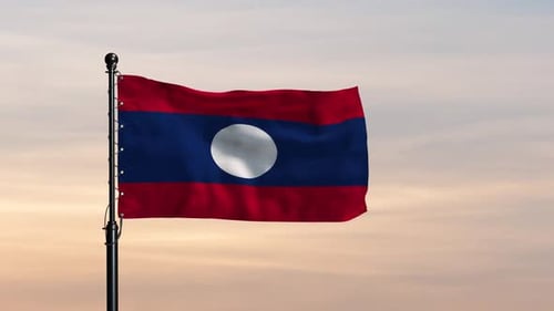 Laos Flag Waving Proudly Against the Sky