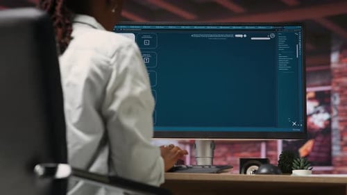 Person Wearing Headphones Uses Text to Image Generative Models on PC