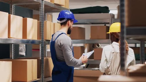 Warehouse Workers Collaborating on Inventory