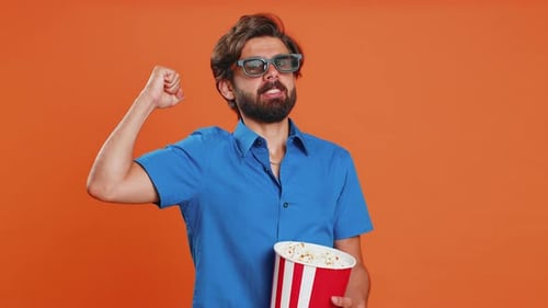 Excited Man with Popcorn and 3D Glasses