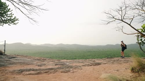 Active Female Hiker Explores Sigiriya Rock Area Backpacking in Sri Lanka Scenery Adventurer Walks
