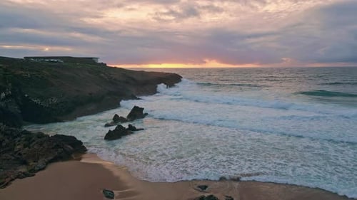 Sunset Sky Ocean Waves Crashing of Coastal Cliffside Drone Shot Beautiful Sea
