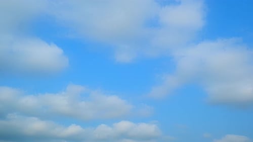 Clouds Drifting in Blue Sky