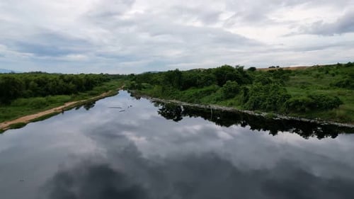 Move over the dirty water river at landfill site