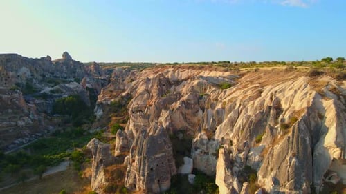 A Captivating Aerial Stock Video of the Cappadocia Region in Turkey Valleys with Houses Gracefully