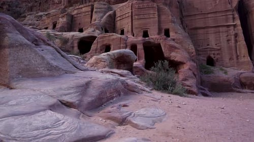 A Rotating Shot of Ancient Nabatean House Facade Carved Out of the Sandrock in Ancient City of Petra