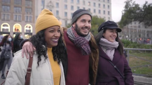 Happy Multiracial Friends in Vacations Walking in Europe City Friendship Concept with Multicultural