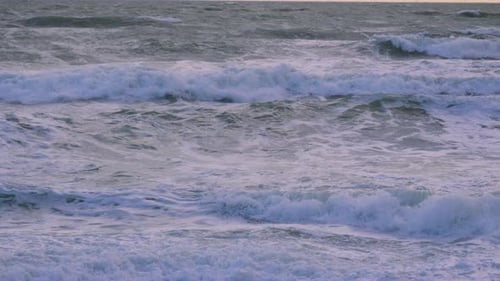 Rolling Ocean Waves Crashing on the Shoreline