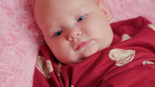 Close up of Baby Lying on Blanket