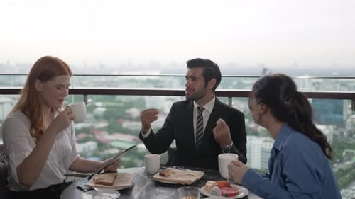 White collar worker meeting at high rise tower.