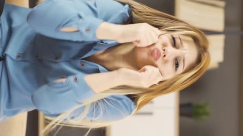 Smiling Woman Waving and Making Silly Faces