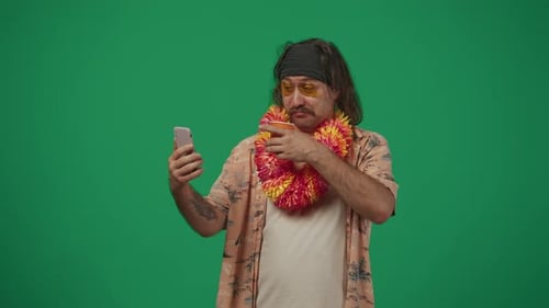 Man Tourist in Casual Clothing Chilling at the Pool Party Having Video Call Conversation on