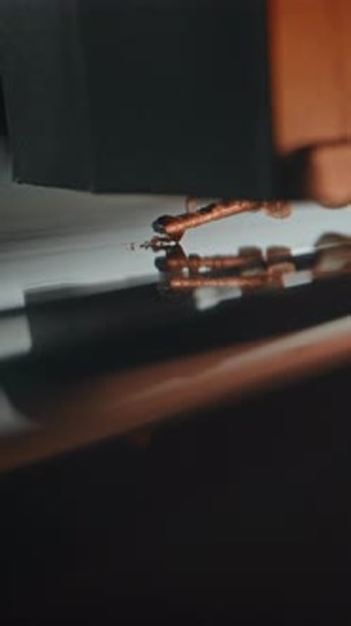 Vinyl Record Player Macro Close Up of Stylus Needle Touching Grooves Playing Melody