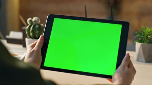 Closeup Green Screen Tablet in Businesswoman Hands Woman Holding Mockup Device