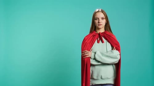 Portrait of Cheerful Heroic Person Posing As Hero in Costume