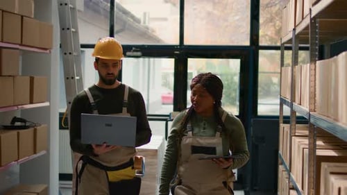 Colleaguers Preparing Warehouse Orders