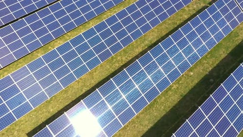 Solar Panel Farm Aerial View on Sunny Day