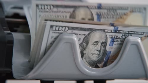 Money Counter Counts Hundred Dollar Bills