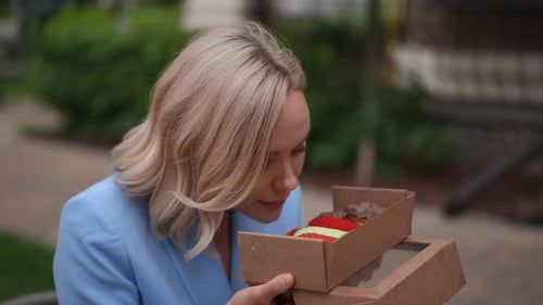 Savoring and Enjoying Deliciously Colorful Treats in a Beautiful Park Setting Outside