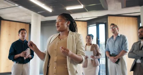 Presenter, workshop and business woman at seminar for motivational speech