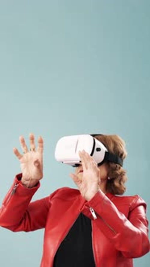 Senior Woman Using Virtual Reality Headset