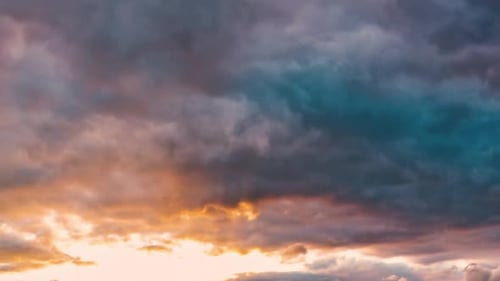 Dramatic Clouds Moving Across Colorful Sky