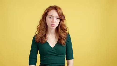 Woman Feeling Sad and Looking Down