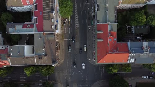 Berlin 2021 4k: Summertime, Day Time golden houre:
a car is being followed from above. overtaking ot