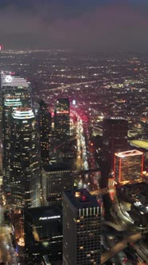 Aerial Scene of Downtown Los Angeles at Night Showing Illuminated Urban Cityscape Modern High Rise