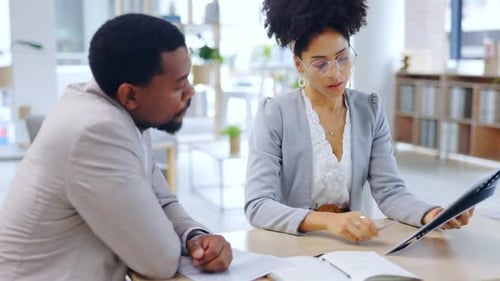Business people, documents and meeting for planning, strategy or corporate analysis at the office
