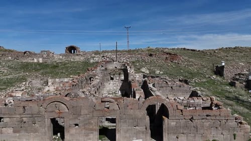 View from above of the rock ruins at Üçkuyu village Değle ruins, historical rock