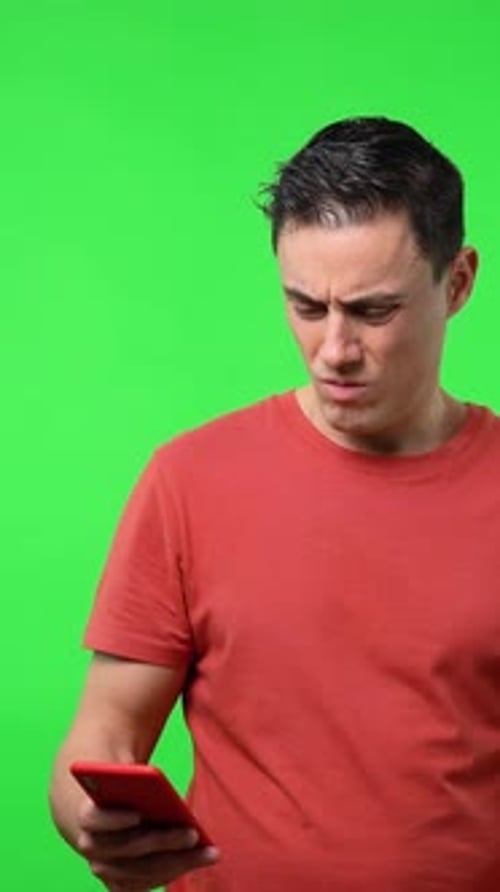 Man Using Smartphone on Green Screen