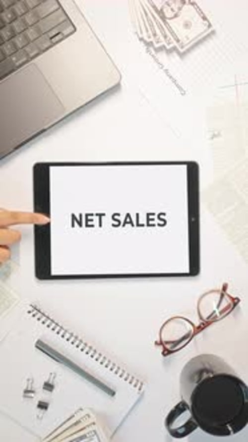 VERTICAL VIDEO OF NET SALES DISPLAYING ON A TABLET SCREEN