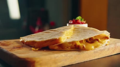 Close Up of Cheese Quesadilla Eating Traditional Mexican Food Tex Mex Cuisine