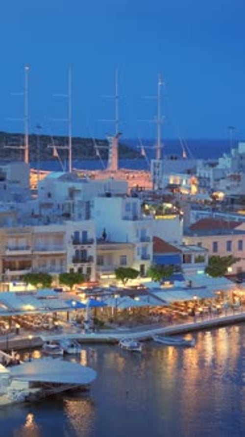 Beautiful Agios Nikolaos Town on Lake Voulismeni at Night Island Crete Greece