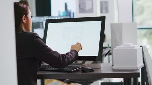Technician Operating on Cad Software to Create Blueprint