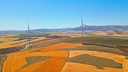 Wind Turbines in Action - Aerial View 2K